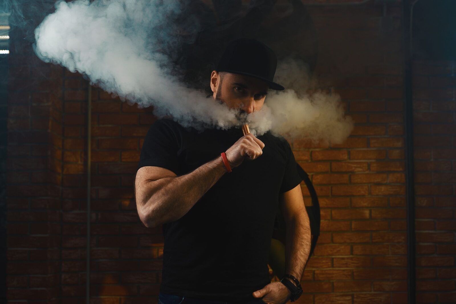 Customer vaping at JoJo Vapes